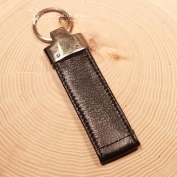 Leder Taschenbaumler destino am Rucksack befestigt zur Veranschaulichung der 13,5 cm Länge.